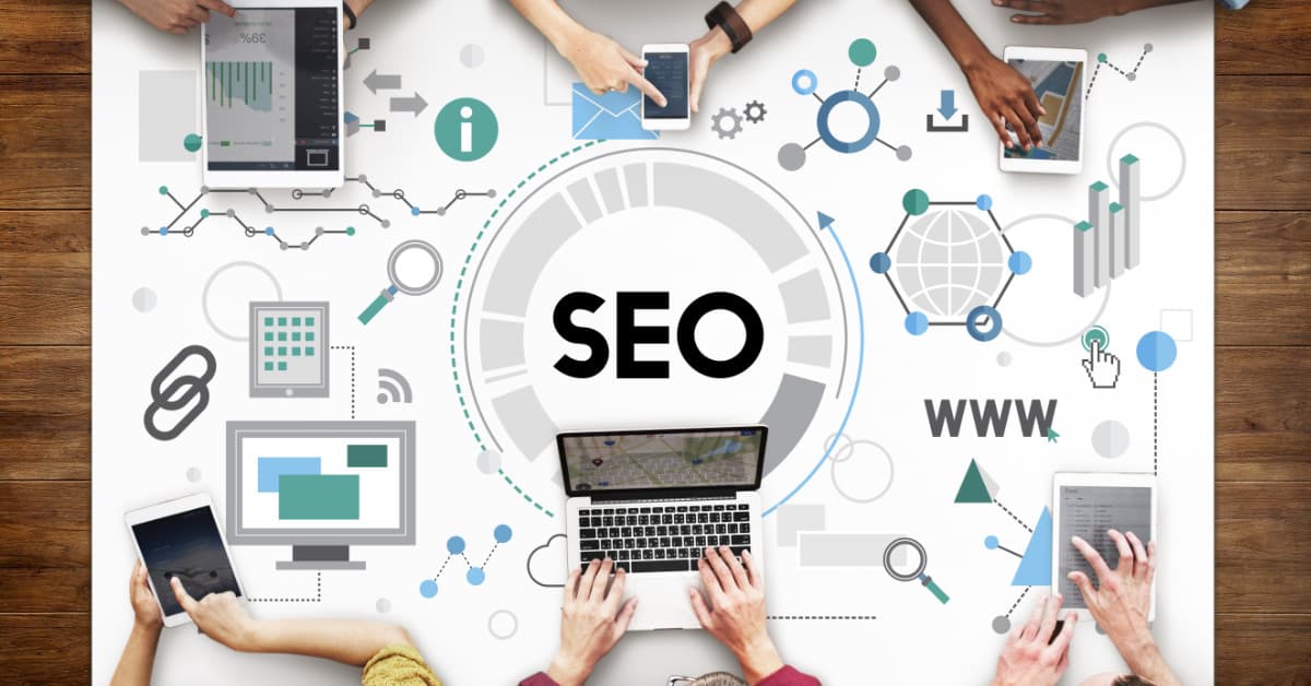 SEO Graphic on table with people working